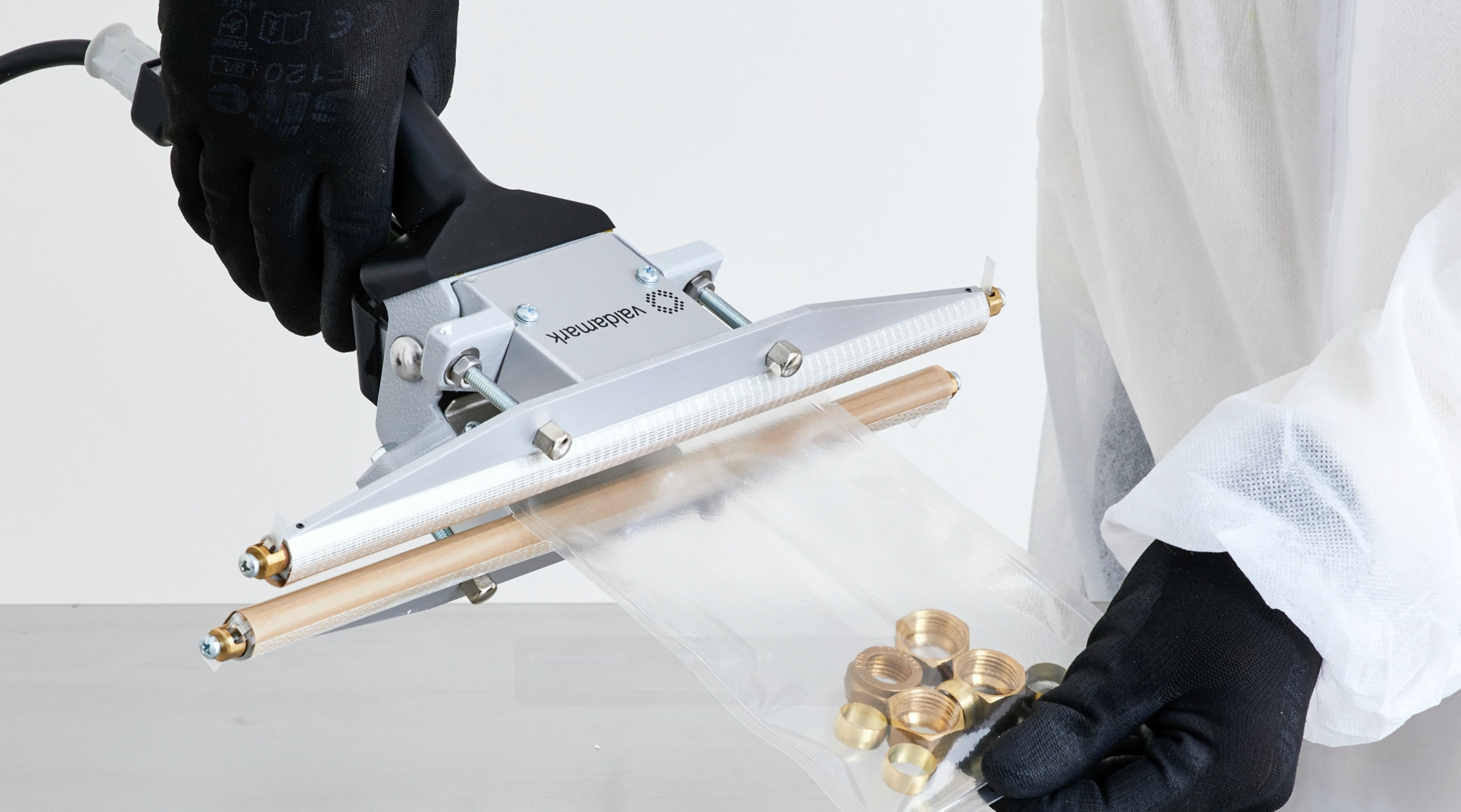 Load video: IVM Hand Held Impulse Sealer Product Video